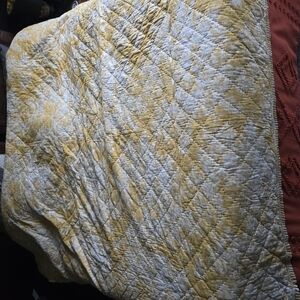 Yellow and White Quilted Bedding